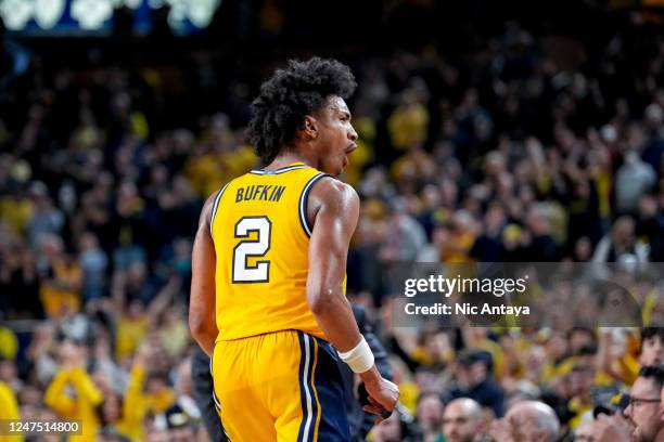 Kobe Bufkin of the Michigan Wolverines reacts against the Wisconsin Badgers during the overtime at Crisler Arena on February 26, 2023 in Ann Arbor,...