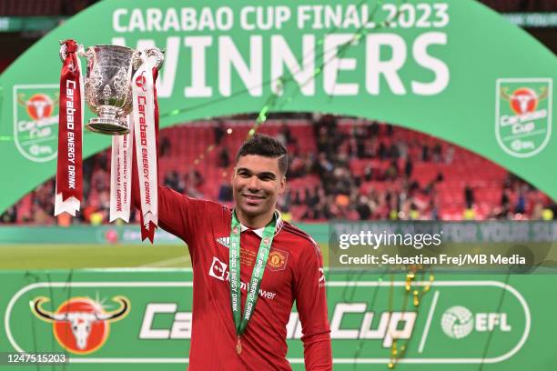 Casemiro of Manchester United celebrates with the trophy after winning the Carabao Cup Final match between Manchester United and Newcastle United at...