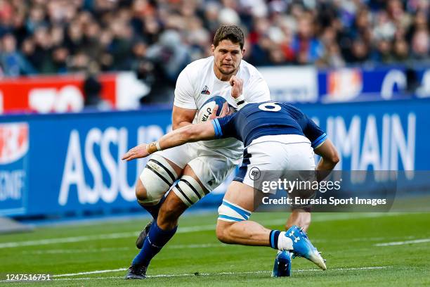 Paul Willemse of France is tackled by Jamie Ritchie of Scotland during the Six Nations Rugby match between France and Scotland at Stade de France on...