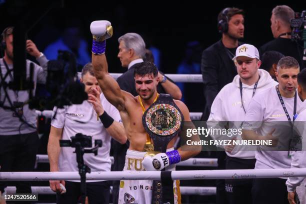 British reality TV star Tommy Fury celebrates after he won by split decision against US YouTuber Jake Paul in a boxing match held at Diriyah in...