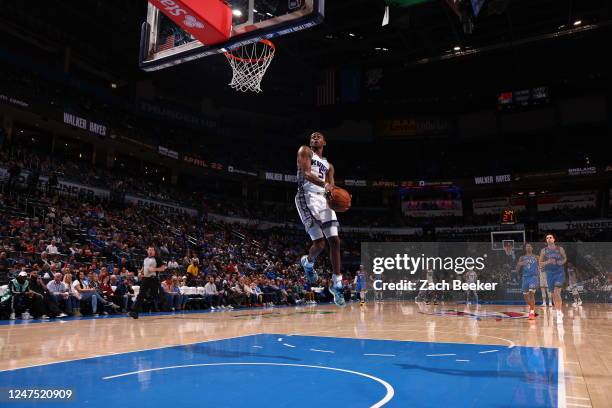 De'Aaron Fox of the Sacramento Kings windmill dunks the ball during the game against the Oklahoma City Thunder on February 26, 2023 at Paycom Arena...