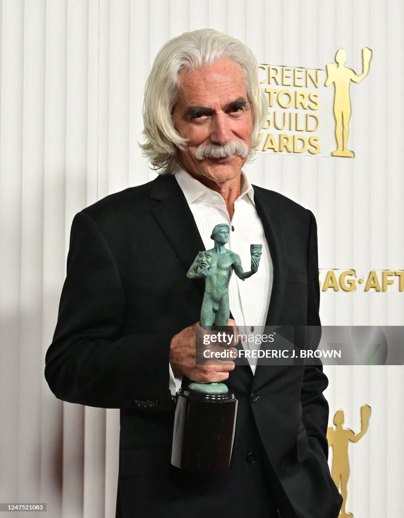 US actor Sam Elliott poses with the award for outstanding Male Actor