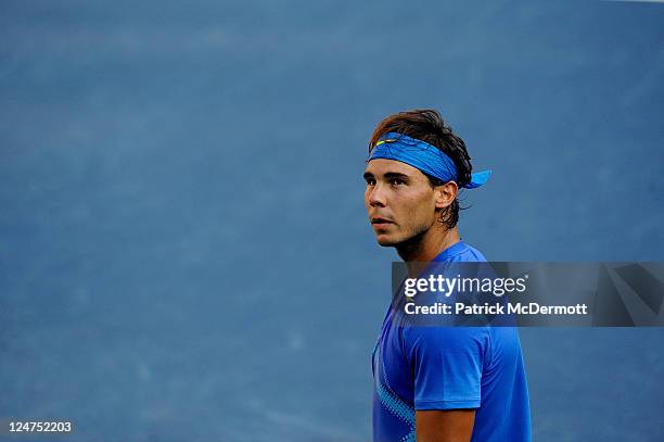 Rafael Nadal of Spain looks on against Novak Djokovic of Serbia during the Men's Final on Day Fifteen of the 2011 US Open at the USTA Billie Jean...