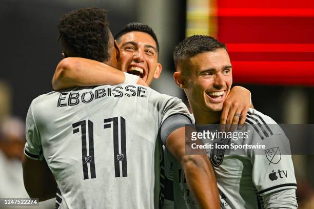 San Jose Earthquakes midfielder Cristian Espinoza and defender Paul Marie celebrate a goal scored by forward Jeremy Ebobisse during the MLS match...