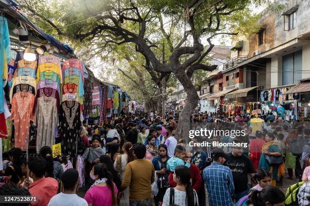 Shoppers crowd at a market in New Delhi, India, on Sunday, Feb. 26, 2023. Indias GDP growth likely slowed to 4.6% year on year in 4Q22 from 6.3% in...