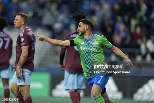 Seattle Sounders midfielder Cristian Roldan celebrates his first half goal during an MLS match between the Seattle Sounders and the Colorado Rapids...