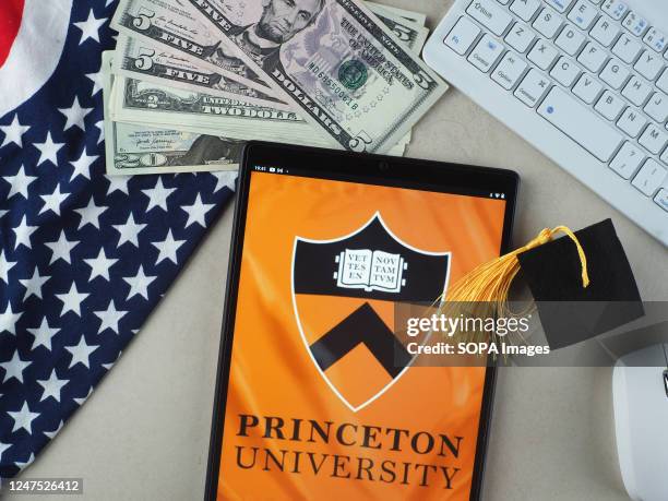 In this photo illustration, Princeton University logo seen displayed on a tablet.