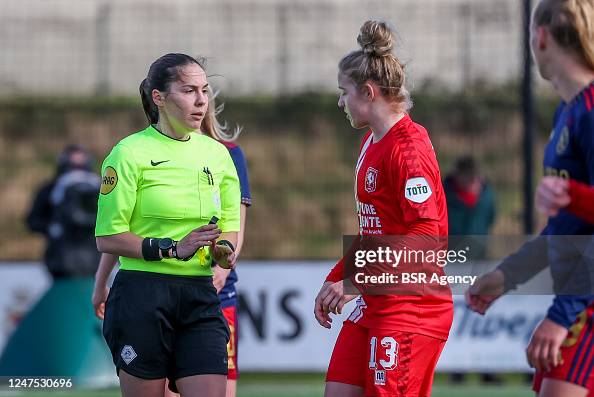 referee Wendy Gijsbers and Elena Dhont of FC Twente during the 1/8