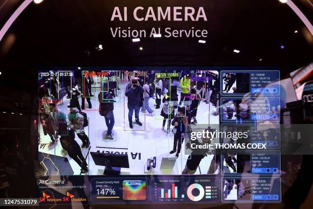 Picture taken on February 27, 2023 shows facial recognition software on the Metaverse stand at the Mobile World Congress , the telecom industry's...