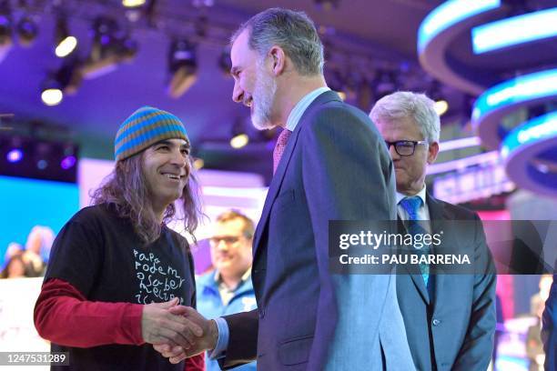 King Felipe VI of Spain meets Telefonica's chief digital officer Chema Alonso at the opening of the Mobile World Congress , the telecom industry's...