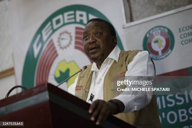 Head of the Africa Union Election Observation Committee and former Kenyan president Uhuru Kenyatta addresses a press conference in Abuja, Nigeria, on...