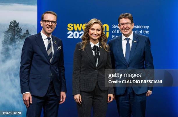 Sweden's Minister for Infrastructure and Housing Andreas Carlson and Minister for Energy, Business and Industry Ebba Busch receive Switzerland's Head...