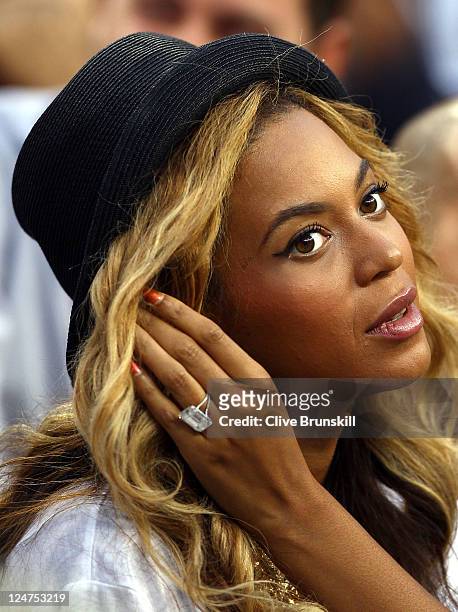 Recording artist Beyonce watches Rafael Nadal of Spain and Novak Djokovic of Serbia play during the Men's Final on Day Fifteen of the 2011 US Open at...