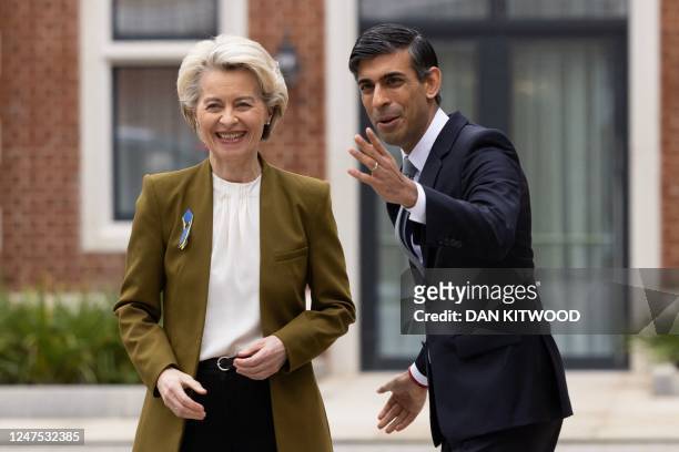 Britain's Prime Minister Rishi Sunak greets European Commission chief Ursula von der Leyen as she arrives at the Fairmont Hotel in Windsor, west of...