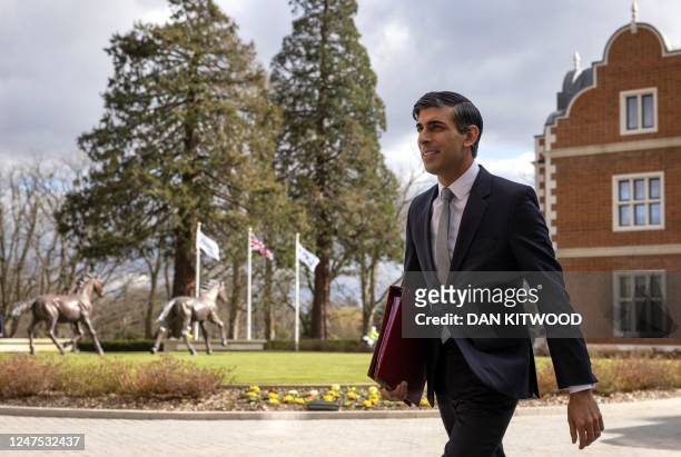 Britain's Prime Minister Rishi Sunak arrives at the Fairmont Hotel in Windsor, west of London on February 27 ahead of his meeting with European...