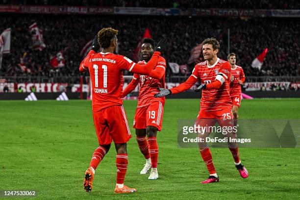 Kingsley Coman of Bayern Muenchen, Alphonso Davies of Bayern Muenchen and Thomas Mueller of Bayern Muenchen celebrates after scoring his team's...