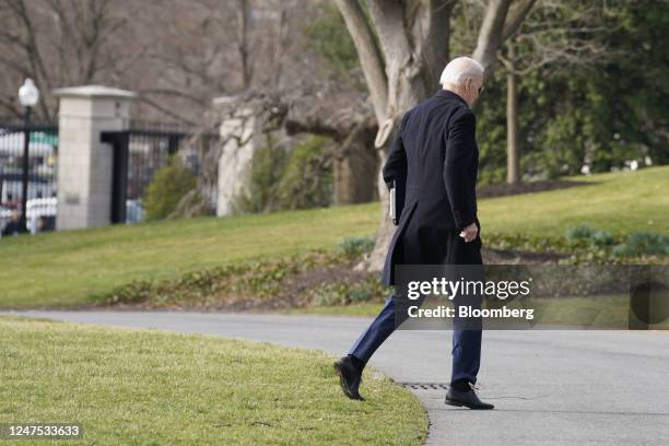 President Joe Biden walks on the South Lawn of the White House after arriving on Marine One in Washington, DC, US, on Monday, Feb. 27, 2023....