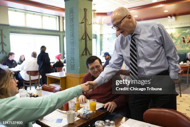 Mayoral Candidate Paul Vallas talks to customers during a meet-and-greet at Ann Sather Restaurant on Feb. 25 in Chicago.
