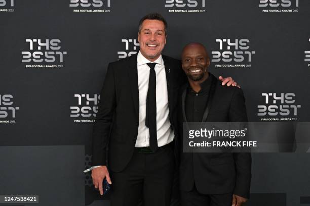 Nch coaching assistant and former football player Claude Makelele and Brazilian former football player Julio Cesar pose upon arrival to attend the...