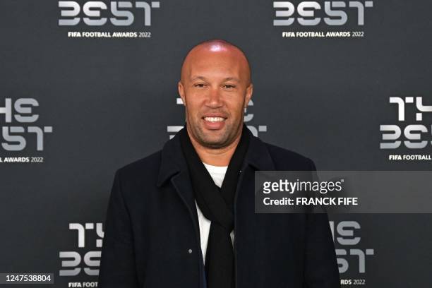 French former football player Mikael Silvestre poses upon arrival to attend the Best FIFA Football Awards 2022 ceremony in Paris on February 27, 2023.