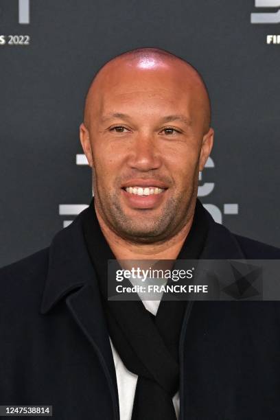 French former football player Mikael Silvestre poses upon arrival to attend the Best FIFA Football Awards 2022 ceremony in Paris on February 27, 2023.