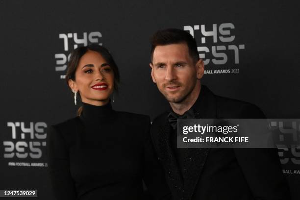 Argentina and Paris Saint-Germain forward Lionel Messi and his wife Antonela Roccuzzo pose upon arrival to attend the Best FIFA Football Awards 2022...