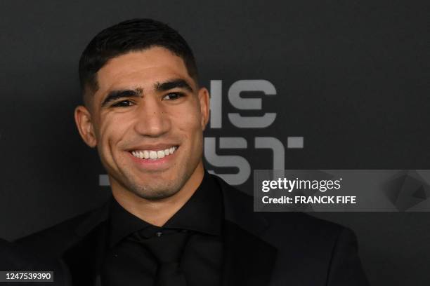 Morocco and Paris Saint-Germain defender Achraf Hakimi poses upon arrival to attend the Best FIFA Football Awards 2022 ceremony in Paris on February...