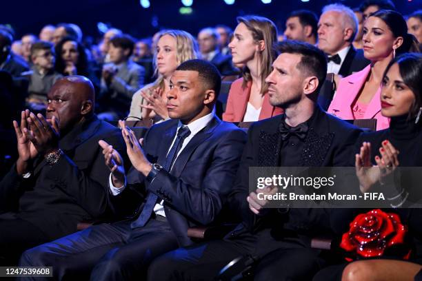 Kylian Mbappe of PSG and France and Lionel Messi of PSG and Argentina during The Best FIFA Football Awards 2022 at Salle Pleyel on February 27, 2023...