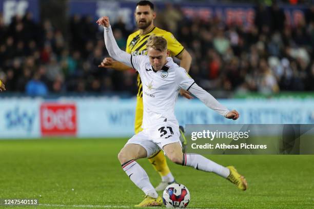 Oliver Cooper of Swansea City takes a shot off target during the Sky Bet Championship match between Swansea City and Rotherham United at the...