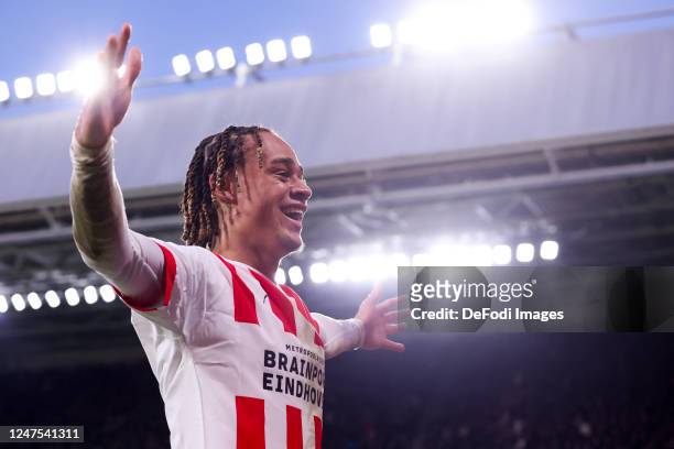 Xavi Simons of PSV Eindhoven Celebrates after scoring his teams 3:1 goal during the Dutch Eredivisie match between PSV Eindhoven and FC Twente at...
