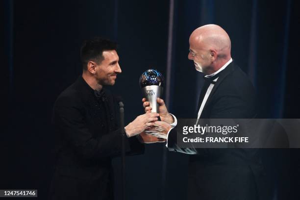 Argentina and Paris Saint-Germain forward Lionel Messi receives from FIFA President Gianni Infantino the Best FIFA Mens Player award during the Best...