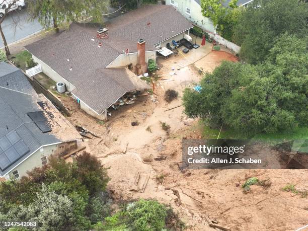 La Cañada Flintridge, CA An aerial view of landslide damage that yellow-tagged two homes, including George Terteryans home, shown at upper right,...