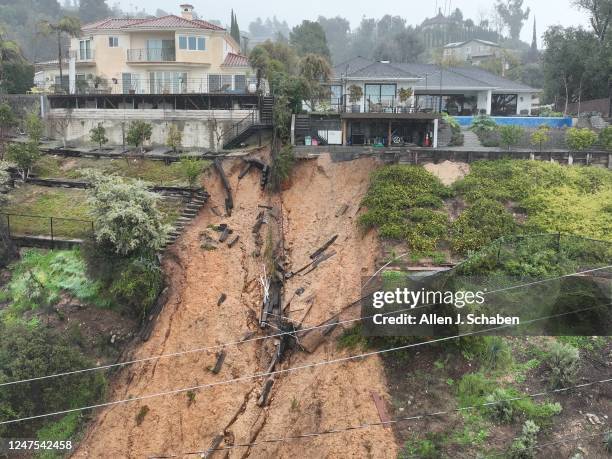 La Cañada Flintridge, CA An aerial view of landslide damage that yellow-tagged two homes, including George Terteryans home, not shown, forcing him...