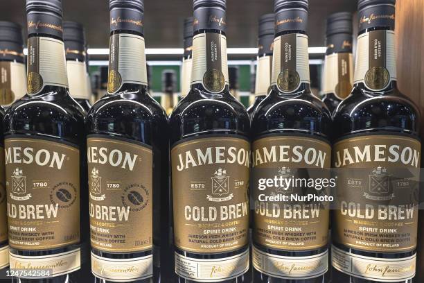 Selection of Jameson Cold Brew Irish Whiskey bottles on display in a Duty Free shop at Dublin Airport, in Dublin, Ireland, on February 17, 2023....