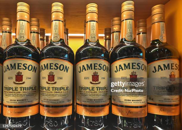 Selection of Jameson Triple Triple Irish Whiskey bottles on display in a Duty Free shop at Dublin Airport, in Dublin, Ireland, on February 17, 2023....