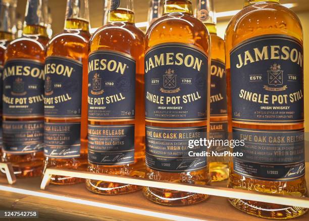 Selection of Jameson Single Pot Still Irish Whiskey bottles on display in a Duty Free shop at Dublin Airport, in Dublin, Ireland, on February 17,...