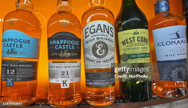 Selection of the best bottles of Irish whiskey on display in a Duty Free shop at Dublin Airport, in Dublin, Ireland, on February 17, 2023. According...