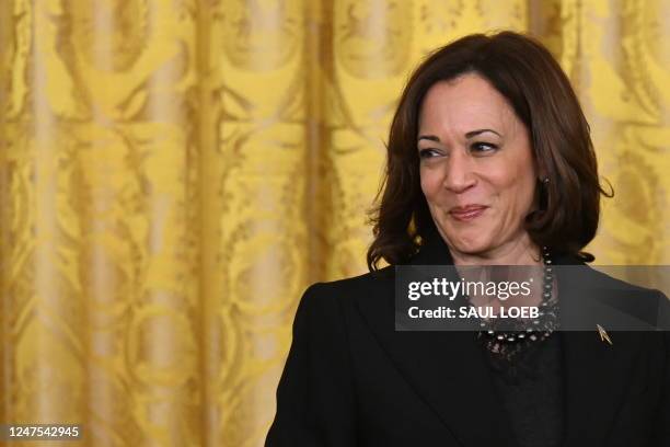 Vice President Kamala Harris looks on during a reception celebrating Black History Month, in the East Room of the White House in Washington, DC, on...