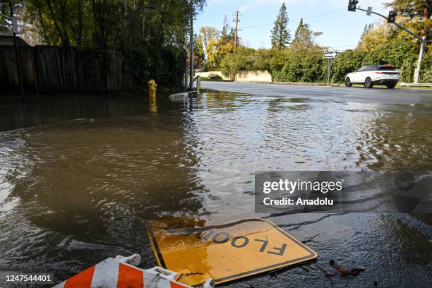 View of a flooded street in Menlo Park as rainstorm hits San Francisco and Bay Area, California, United States on February 27, 2023.