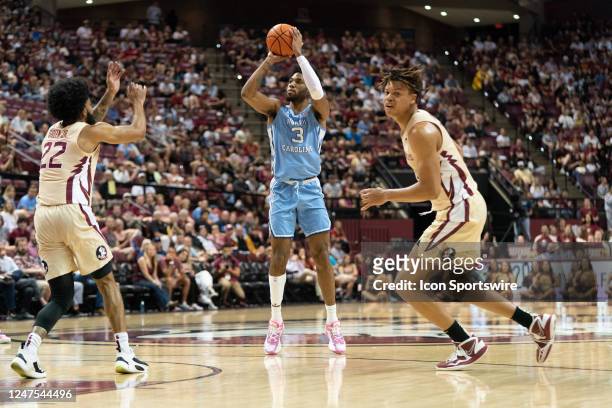 North Carolina Tar Heels guard Dontrez Styles shoots a jumpsuit during a college basketball game against the Florida State Seminoles at the Civic...