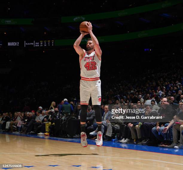 Kevin Love of the Miami Heat shoots a three point basket against the Philadelphia 76ers on February 27, 2023 at the Wells Fargo Center in...