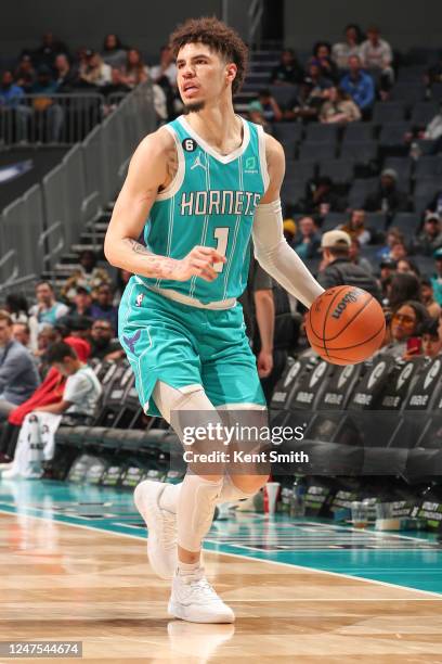 LaMelo Ball of the Charlotte Hornets handles the ball during the game on Febuary 27, 2023 at Spectrum Center in Charlotte, North Carolina. NOTE TO...