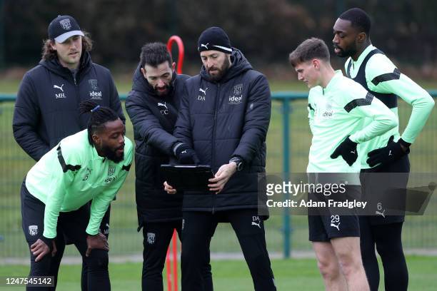 Carlos Corberan Head Coach / Manager of West Bromwich Albion and Damia Abella Coach of West Bromwich Albion review training with players suing an...