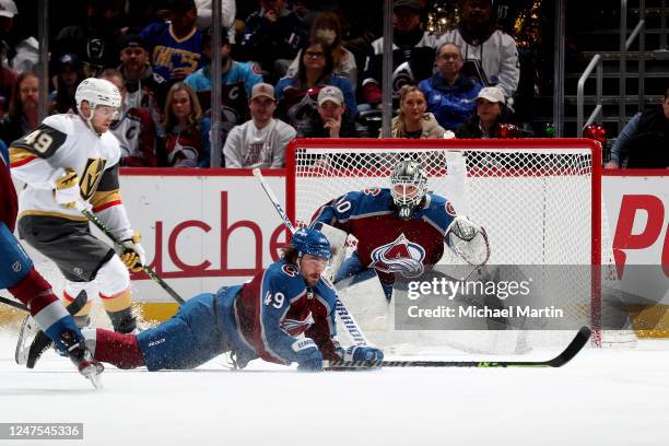 Samuel Girard and goaltender Alexandar Georgiev of the Colorado Avalanche defend against the Vegas Golden Knights at Ball Arena on February 27, 2023...