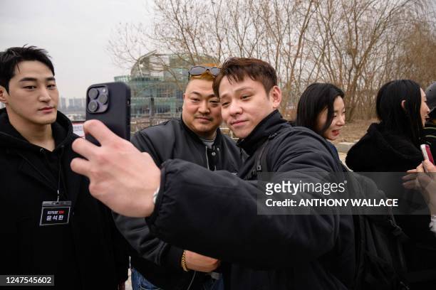 In this photo taken on February 18 Korean car dealer Jo Jin-hyeong and wrestler Jang Eun-sil , both contestants from the new Netflix show Physical:...