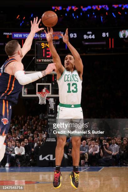 Malcolm Brogdon of the Boston Celtics shoots a three point basket during the game against the New York Knicks on February 27, 2023 at Madison Square...