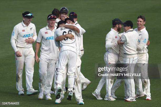 New Zealand players celebrates their win during day five of the second cricket Test match between New Zealand and England at the Basin Reserve in...