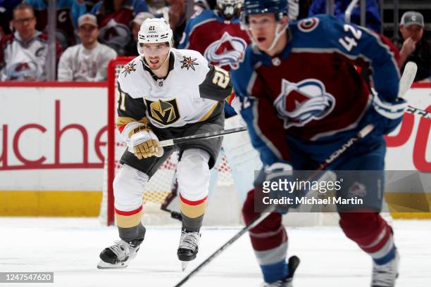 Brett Howden of the Vegas Golden Knights skates against Josh Manson of the Colorado Avalanche at Ball Arena on February 27, 2023 in Denver, Colorado.