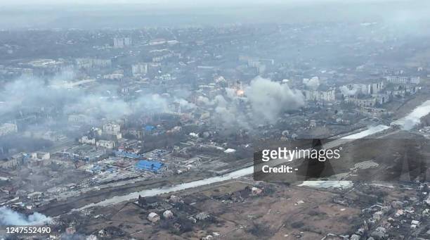 This video grab taken from a shooting by AFPTV shows an aerial view of destructions during fighting in the city of Bakhmut on February 27, 2023. -...