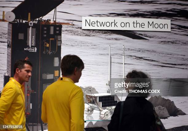 Nokia employee explain a project to install a data network on the moon in collaboration with the NASA at the Mobile World Congress , the telecom...